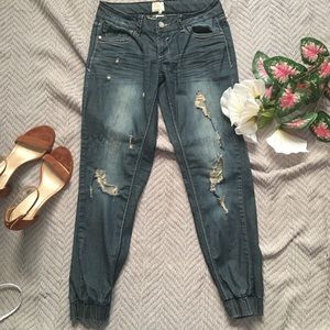 7” Rise Lightly Distressed Jogger Denim.